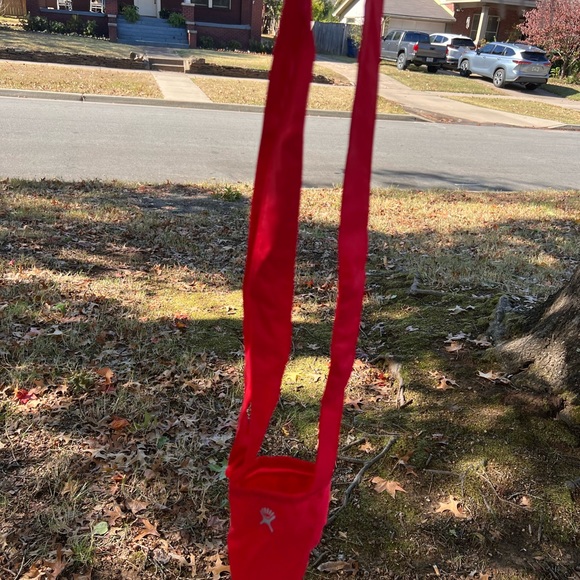 Hydro flask- water bottle holder!! red, has a little pouch on the back! - Picture 2 of 3